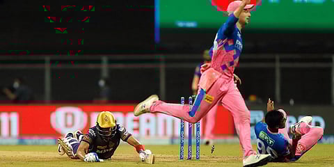 os Buttler of Rajasthan Royals runs out Shubman Gill of Kolkata Knight Riders during an IPL 2021 match in Mumbai. (Photo| ANI)