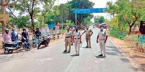 Police personnel on duty at Chaksuliapada check gate. (Photo | EPS)