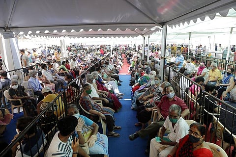 People wait to receive the COVID-19 vaccine outside a vaccination centre In Mumbai, India, Saturday, April 24, 2021. (Photo | AP)