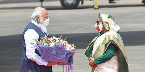 PM Narendra Modi arrives in Bangladesh, where he was welcomed by PM Sheikh Hasina. (Photo | Narendra Modi Twitter)