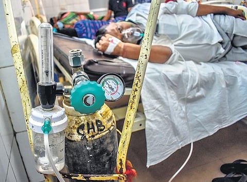 A patient under treatment at emergency ward of Capital Hospital in Bhubaneswar on Sunday | Biswanath Swain