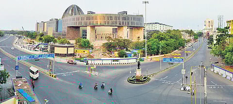 The Anna Statue junction on Mount Road wears a deserted look during the lockdown, in Chennai on Sunday. The police said not many violations were reported in the city | P Jawahar