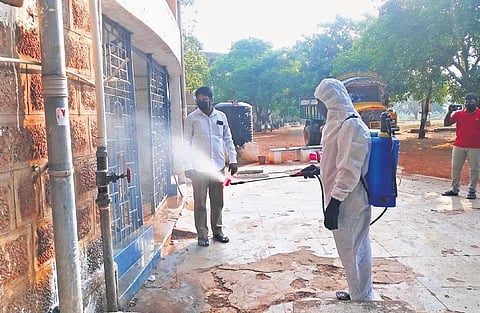 A health worker sanitising Andhra University hostels in Visakhapatnam | G Satyanarayana