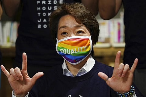 Tokyo 2020 Organizing Committee President Seiko Hashimoto wearing a rainbow-colored mask (Photo | AP)