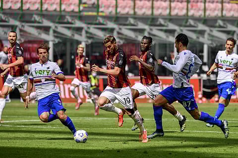 AC Milan's Theo Hernandez (C) challenges Sampdoria's Adrien Silva (L) during Serie A match on April 03, 2021 at the San Siro stadium in Milan. (Photo | AFP)