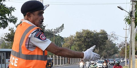 A Maheshwara regulating traffic at Kautilya circle In Mysuru. (Photo| Udayshankar S, EPS)