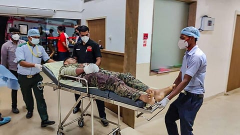 A security personnel is shifted for treatment after he was injured in an encounter with Naxals in Bijapur district of Chhattisgarh. (Photo | PTI)