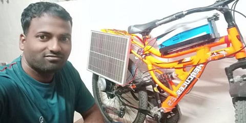 Mupparapu Raju with his solar powered bike. (Photo| EPS)