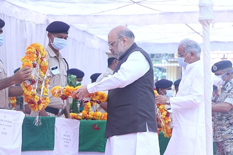 Union minister Amit Shah and Chhattisgarh CM Bhupesh Baghel paying their tributes to slain jawans in Jagdalpur on Monday. (Photo | Express)