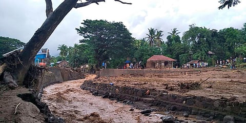 Residents inspect the damage at a village affected by flooding on Adonara Island, East Flores, Indonesia. (Photo| AP)