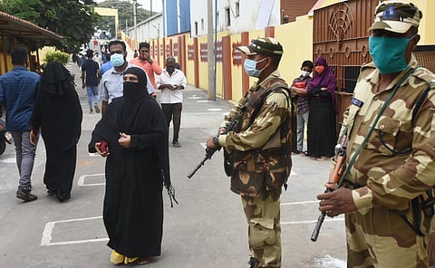 Voters queuing up at a polling booth in Coimbatore. (Photo | U Rakesh Kumar, EPS)