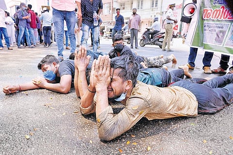 Protesters who figure in the PSC rank lists of forest watcher, depot watcher and reserve watcher posts crawl on their knees in front of the Secretariat | File Picture