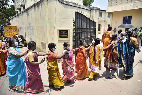 Members of Tamil Nadu association of the blind, Thandiar, on their way to polling booth to cast their vote, in Chennai on Tuesday. (Photo | P Jawahar, EPS)