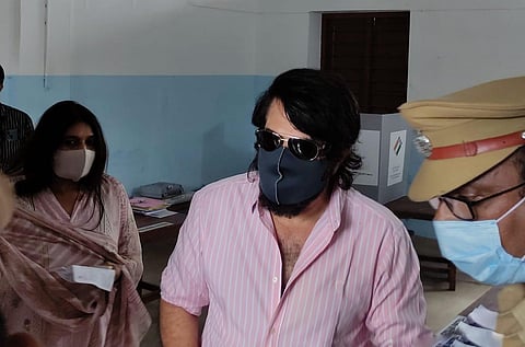Actor Mammooty coming out of the polling booth with his wife Sulfath after casting his vote in the assembly election at CKS LP School in Ponnurunni in Kochi (Photo: A Sanesh)