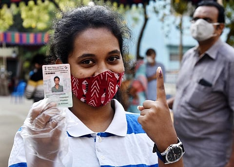 The first time voter discloses the indelible ink mark on her point finger after casting her vote, at SIET College, in Chennai. (Photo | P.Jawahar/EPS)