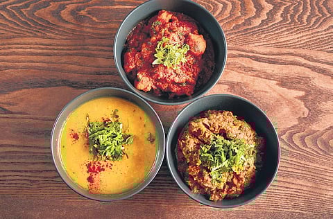 Trio of tadka daal, mangodi, and baigan bharta