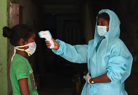 A health department official conducting door-to-door testing at Kotturpuram, in Chennai. (Photo | Sri Loganathan V, EPS)
