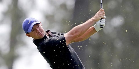Rory McIlroy tees off on the fourth hole during the first round of the Masters golf tournament at Augusta National Golf Club. (Photo | AP)