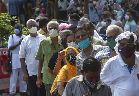 People queue up for COVID-19 vaccine in Mumbai, India, Monday, April 26, 2021. (Photo | AP)