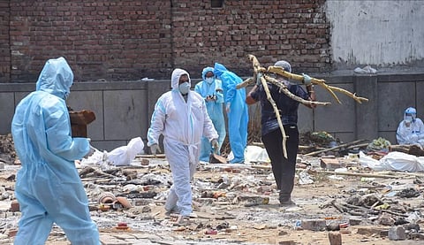 COVID-19 victims at Seemapuri cremation ground as coronavirus cases surge in New Delhi, Sunday, May 9, 2021. (Photo | PTI)
