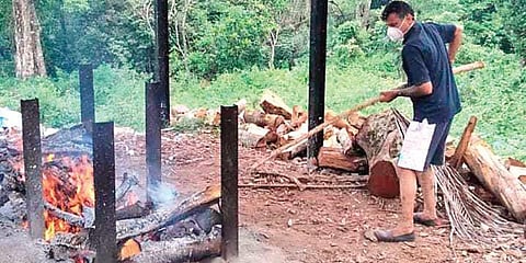 Families of 145 members are forced to depend on alms from families of deceased persons who come to the site for last rites and hand loans from friends and relatives helping them for two square meals a day