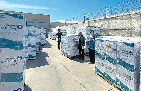 Oxygen concentrators lined up at an airport in the US for their delivery. (Photo | EPS)