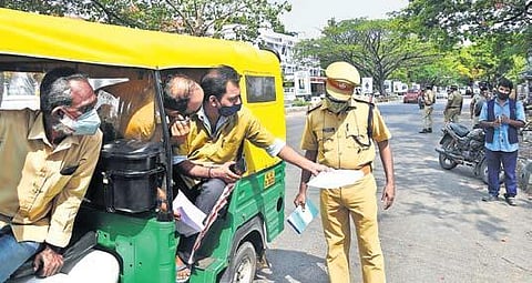 Police checking under way at High Court Junction in Kochi on Monday. More policemen have been deployed to ensure that the lockdown restrictions are followed without fail | Albin Mathew