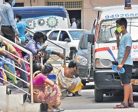 Patients seeking hospital admission wait in ambulances outside Vijayawada GGH’s Covid block on Tuesday | P Ravindra Babu