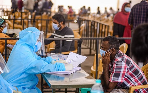 A nurse consulting a Covid-19 patient outside Corona Outpatient Department at Rajiv Gandhi Government General Hospital in Chennai.