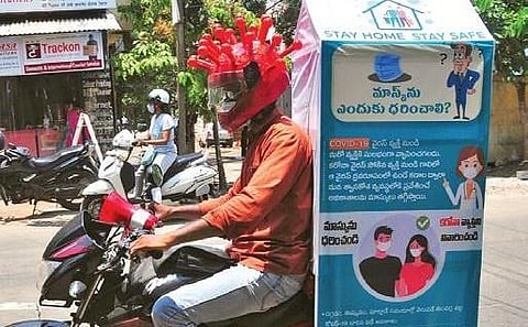 During his ride every day, Durga Prasad plays a recording in own voice on the precautions to be taken to prevent the spread of the deadly virus.