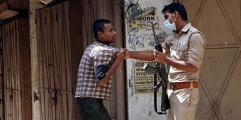 Police personnel punishes the violator during a lockdown, in Lucknow. (Photo | ANI)