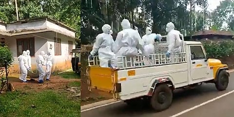 Neighbors and volunteers in PPE kits taking Sabu to Nileshwar taluk hospital in a pickup truck. (Videograb)