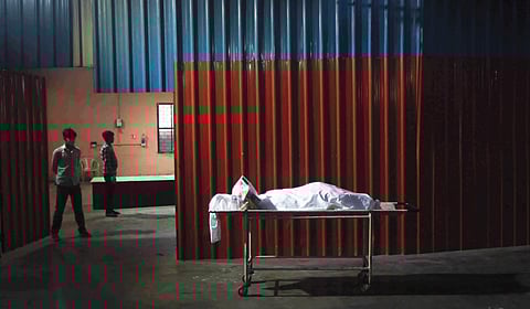 A Covid-19 victim's body at Nigam Bodh Ghat crematorium in Delhi