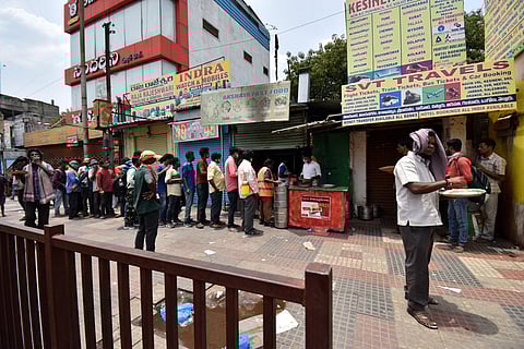 GHMC’s Annapurna Canteen workers distributing food at Secunderabad on Thursday | S Senbagapandiyan