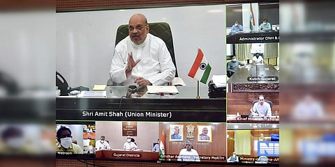 Union Home Minister Amit Shah chairs a review meeting with the CMs of Gujarat and Maharashtra to deal with the cyclone Tauktae. (Photo| ANI)