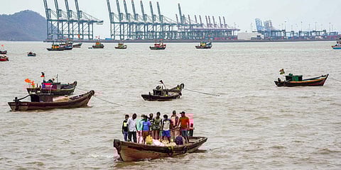 Fishing boats anchored due to cyclone Tauktae alert, at Mora Jetty Uran, in Navi Mumbai. (Photo| PTI)