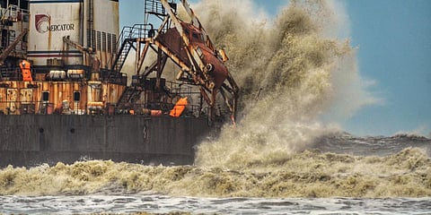 High sea waves due to cyclone Tauktae hit Bhagavathi Prem Sinken Dredger, at Surathkal Beach near Mangaluru. (Photo| PTI)