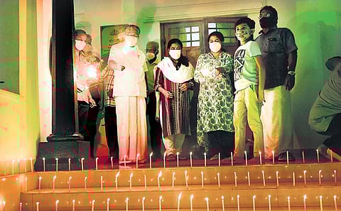 Chief Minister Pinarayi Vijayan takes part in the LDF’s ‘Victory Day’ celebrations along with his family at Cliff House in T’Puram in this file photo. (Vincent Pulickal | EPS)