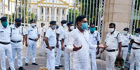 A person demonstrates with sheep against West Bengal Governor Jagdeep Dhankar on the Narada issue in front of Raj Bhavan in Kolkata. (Photo | ANI)