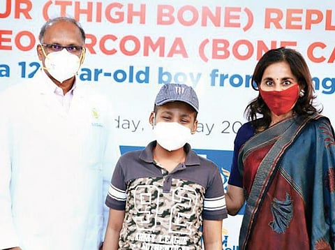 The boy with Apollo MD Suneeta Reddy and senior consultant paediatric orthopaedic spine surgeon R Sankar