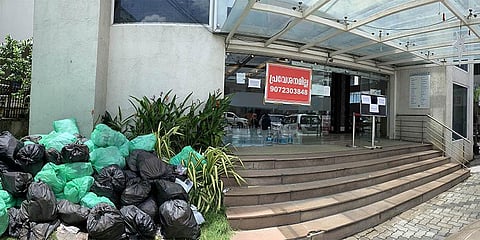 Garbage bags piled up at the entrance of PVS Hospital in Kaloor, which is a Covid First Line Treatment Centre. Triple lockdown restrictions is affecting waste management in many areas | Albin Mathew