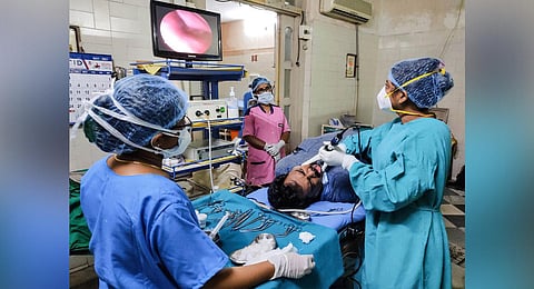 Doctors performing a Diagnostic Nasel Endoscopy to detect Black fungus at a hospital in Hyderabad. (Photo | EPS)
