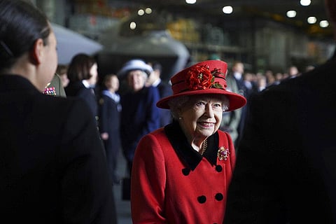 Britain's Queen Elizabeth II smiles during a visit to HMS Queen Elizabeth at HM Naval Base, ahead of the ship's maiden deployment, in Portsmouth. (Photo | AP)