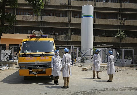 Jammu and Kashmir State Disaster Response Force soldiers who are assisting the fight against COVID-19 stand outside government medical hospital in Jammu. (Photo | AP)