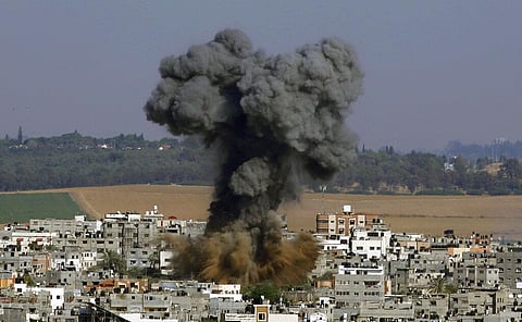 Smoke rises after an Israeli airstrike in Gaza City. (File photo | AP)