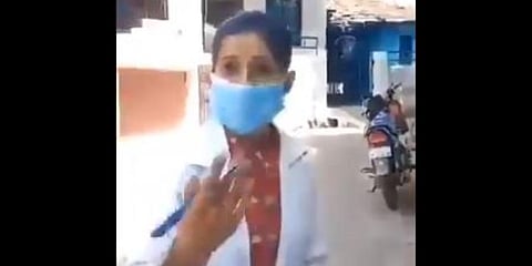 In the video, the woman doctor, who is wearing a mask, is seen talking to a man who was shooting the incident on his mobile camera. (Photo | Rameshwar Sharma Twitter)