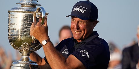Phil Mickelson holds the Wanamaker Trophy after winning the PGA Championship golf tournament on the Ocean Course. (Photo| AP)