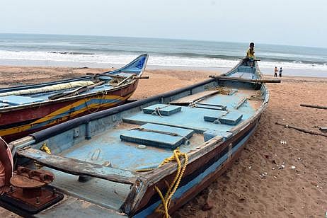 Boats are seen anchored on the shore due to Cyclone Yaas, in Puri. (Photo | Express)