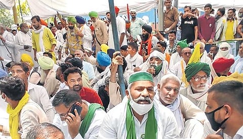 BKU leader Rakesh Tikait along with farmers in Hisar on Monday. (Photo | PTI)