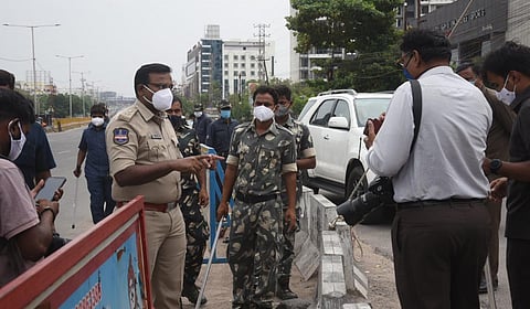 Cyberabad DCP Vijay Kumar seen arguing with media personnel covering the lockdown at Miyapur in Hyderabad on Monday. (Photo | Express)